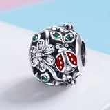 S925 sterling silver Oxidized zirconia flower border charms